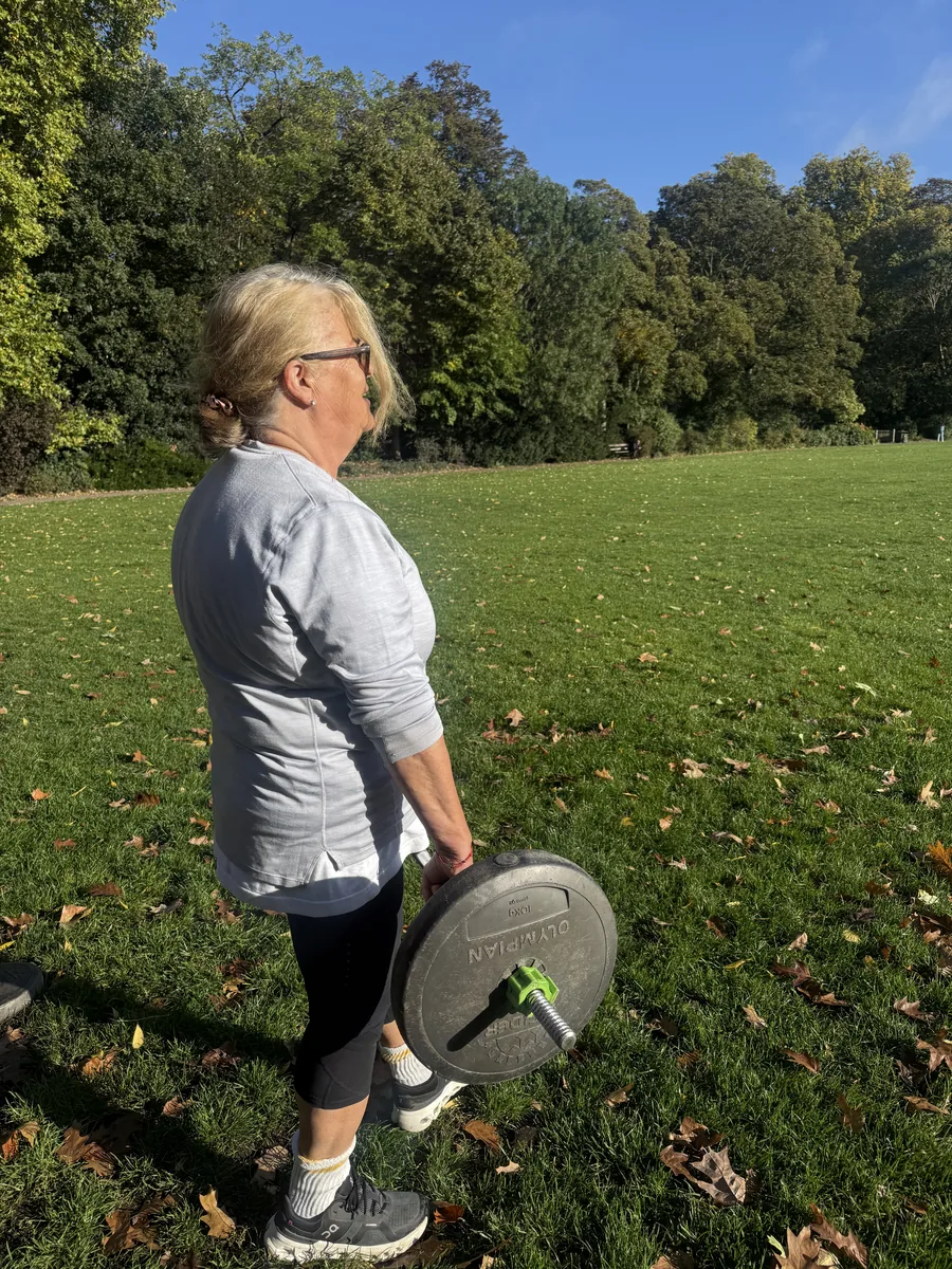 Client training outdoors in Battersea Park with personal trainer Dan Edwards